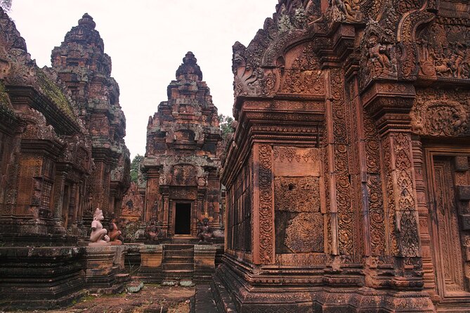 13 Days Private Tour to Cambodia, Angkor Wat and Vietnam - Banteay Srei and Kampong Phluk: pink sandstone + life on water