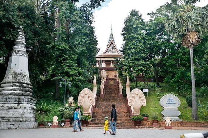 Classic Phnom Penh City Full Day Tour - Wat Phnom: the climb, the prayers, and the founding story