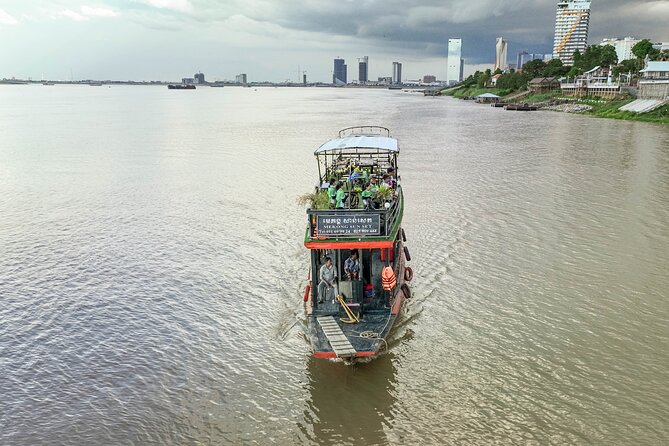 Phnom Penh Bike & Boat Sunset Tour / E-Bike Available - Koh Oknha Tei sunset cruise: two rivers, one relaxed hour