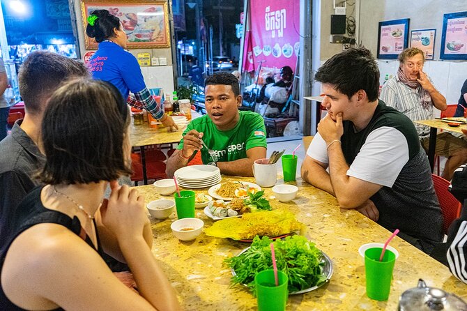 Phnom Penh Evening Food Tour - Inclusive 5 stops local Tastings - Royal Palace Back-Alley Sampling: Dried Buffalo Meat and Street Bugs