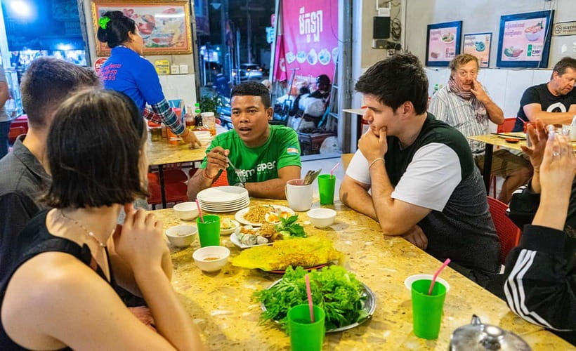 Phnom Penh: Evening Food Tour with Drinks & Tuk Tuk Included - The back alley near the Royal Palace: a home-cook dish with real character