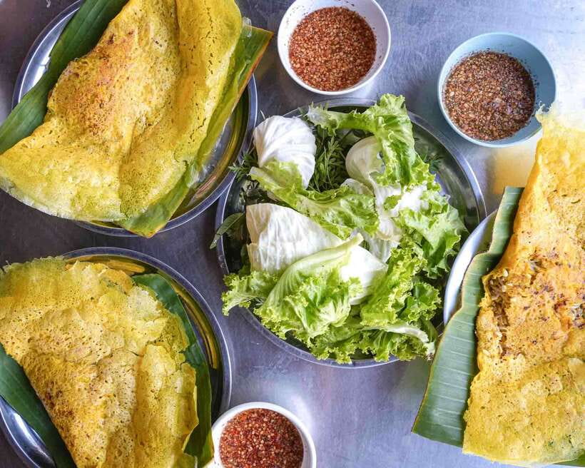 Phnom Penh: Morning Market & Guided Breakfast Tour by Tuktuk - Stop 4: Savory turmeric crepes you wrap by hand