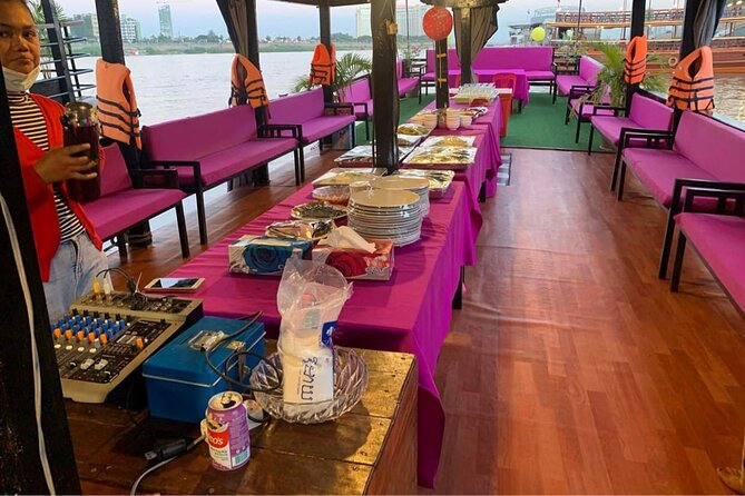 Phnom Penh to Siem Reap Cruise/road tour or Siem Reap/Phnom Penh - The morning Mekong River cruise: sights, music, and city glow